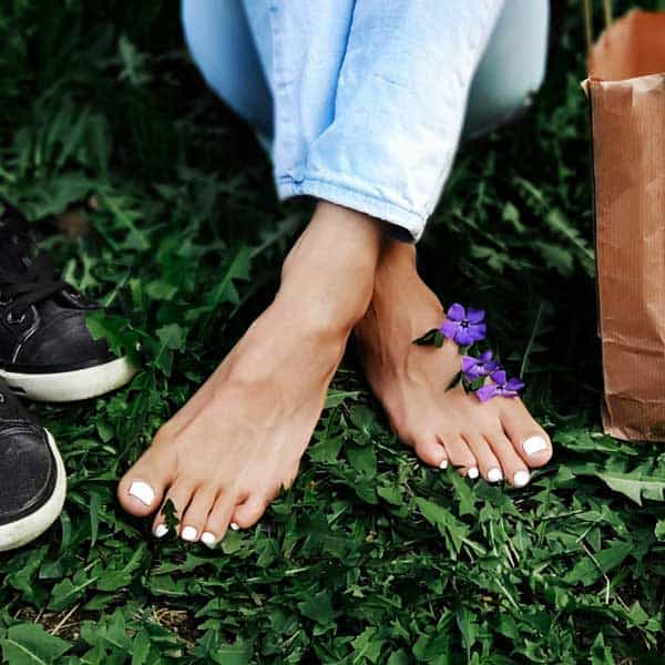 dark skinned lady barefoot during the oklahoma summer